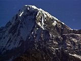 603 Hiunchuli Close Up Early Morning From Past New Bridge After leaving New Bridge, I looked back to see Hiunchuli glisten in the early morning sun. Hiunchuli (6441m) was first climbed on October 10, 1971 by Americans Craig Anderson, Peter Cross, Jim Richards, John Skow, and Lane Smith.